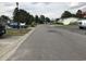 Neighborhood street scene with various homes and parked cars, highlighting a community with tree-lined streets at 212 Weyburn St., Myrtle Beach, SC 29579