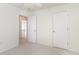 Bedroom featuring neutral walls, carpet, ceiling fan, and large closet at 237 Chesapeake Ln., Murrells Inlet, SC 29576