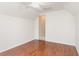 Hardwood bedroom with white walls and door to another room at 237 Chesapeake Ln., Murrells Inlet, SC 29576