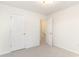 Bright bedroom with two closets and neutral walls and carpeting at 237 Chesapeake Ln., Murrells Inlet, SC 29576