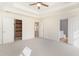 Large bedroom with a view of the closet, bathroom, and hallway through multiple entryways at 237 Chesapeake Ln., Murrells Inlet, SC 29576