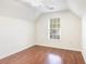 Bedroom with hardwood flooring, white walls, and natural light from window at 237 Chesapeake Ln., Murrells Inlet, SC 29576