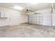 Spacious garage featuring concrete flooring, white walls, and an open garage door at 237 Chesapeake Ln., Murrells Inlet, SC 29576