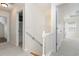 Hallway with a carpeted floor and white walls, connecting to other rooms in the home at 237 Chesapeake Ln., Murrells Inlet, SC 29576
