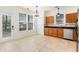 Bright eat in kitchen with tile flooring, wood cabinets, and stainless steel appliances at 237 Chesapeake Ln., Murrells Inlet, SC 29576