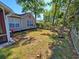 Well-maintained backyard with green grass and a partial fence line at 2488 Oriole Dr., Murrells Inlet, SC 29576