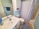 Cozy bathroom with a shower-tub combo and a white vanity at 2488 Oriole Dr., Murrells Inlet, SC 29576