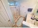 Bright bathroom with a walk-in shower, double sinks, and a tile floor at 2488 Oriole Dr., Murrells Inlet, SC 29576