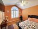 Orange accent bedroom with a large window and a ceiling fan at 2488 Oriole Dr., Murrells Inlet, SC 29576