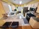 Modern kitchen with stainless steel appliances, breakfast bar, and ample counter space at 2488 Oriole Dr., Murrells Inlet, SC 29576
