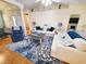 Comfortable living room with ample seating, stylish rug, and bright, airy feel at 2488 Oriole Dr., Murrells Inlet, SC 29576