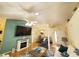 Open-concept living room with a fireplace, comfortable seating, and direct access to the dining area at 2488 Oriole Dr., Murrells Inlet, SC 29576