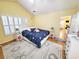 Main bedroom with a flamingo-themed bedspread, vaulted ceiling, and shuttered windows at 2488 Oriole Dr., Murrells Inlet, SC 29576