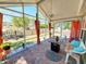 Enjoy the screened porch with brick floor and fenced in yard at 2488 Oriole Dr., Murrells Inlet, SC 29576