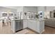 Kitchen island with stainless steel appliances and granite countertops at 255 Augusta Green Way, Myrtle Beach, SC 29579