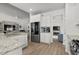 Well-lit kitchen with stainless steel appliances and granite countertops at 255 Augusta Green Way, Myrtle Beach, SC 29579