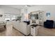 Inviting living room with a large entertainment center, plush seating, and natural light at 255 Augusta Green Way, Myrtle Beach, SC 29579