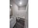 Bright bathroom featuring a vanity with marble countertop and a bathtub with a shower head at 2601 Sand Dunes Dr., Myrtle Beach, SC 29577