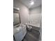 Bright bathroom featuring a vanity with marble countertop and a bathtub with a shower head at 2601 Sand Dunes Dr., Myrtle Beach, SC 29577