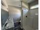 Bathroom featuring double vanity, tiled floors, and walk-in shower, offering comfort and style at 2601 Sand Dunes Dr., Myrtle Beach, SC 29577