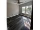 Bright bedroom featuring modern gray floors and natural light with bright walls creating a cozy atmosphere at 2601 Sand Dunes Dr., Myrtle Beach, SC 29577