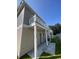 Exterior shot featuring a balcony that overlooks a small yard, showcasing the property's outdoor space at 2601 Sand Dunes Dr., Myrtle Beach, SC 29577