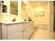 Bathroom with double sinks, bathtub, toilet, and tile flooring at 273 Golden Bear Dr. # F3, Pawleys Island, SC 29585