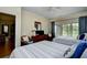 Bedroom features two beds, furniture, and a sliding door with golf course views at 273 Golden Bear Dr. # F3, Pawleys Island, SC 29585