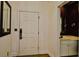 Entryway with a paneled door leading to a half bath at 273 Golden Bear Dr. # F3, Pawleys Island, SC 29585
