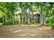 View of the property with lush mature trees at 273 Golden Bear Dr. # F3, Pawleys Island, SC 29585