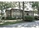 Traditional two-story home with brick and siding, dormers and mature landscaping at 273 Golden Bear Dr. # F3, Pawleys Island, SC 29585