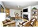 Comfortable living room with a fireplace, stylish decor, and a bar area at 273 Golden Bear Dr. # F3, Pawleys Island, SC 29585