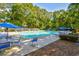 Community pool with ample seating and shade at 273 Golden Bear Dr. # F3, Pawleys Island, SC 29585