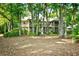Spacious home with screened porches, blending indoor comfort with outdoor living in a wooded setting at 273 Golden Bear Dr. # F3, Pawleys Island, SC 29585