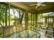 Relax and entertain on this screened porch that overlooks scenic community grounds and a golf course at 273 Golden Bear Dr. # F3, Pawleys Island, SC 29585