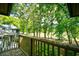Balcony view overlooking green trees and golf course at 273 Golden Bear Dr. # F3, Pawleys Island, SC 29585