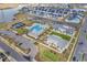 Overhead view of community pool, clubhouse, tennis courts and lake at 296 Switchgrass Loop, Little River, SC 29566