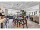 Elegant dining room featuring coffered ceilings, wood flooring, and plenty of natural light at 296 Switchgrass Loop, Little River, SC 29566