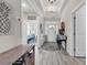 Bright entry hall showcasing stylish decor, natural light, and a glimpse of the home's layout at 296 Switchgrass Loop, Little River, SC 29566