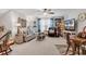 Cozy living room features a ceiling fan, comfortable seating, and decor throughout at 296 Switchgrass Loop, Little River, SC 29566