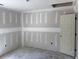 Bedroom showcases unfinished walls, a standard door, and ample space, waiting for personalization at 2991 Inheritance Rd., Conway, SC 29527
