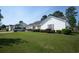 Charming single-story home with well-maintained landscaping and a lush green lawn at 331 Andorra St., Longs, SC 29568