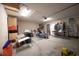 Spacious garage featuring overhead lighting and storage space; ideal for organization and vehicle parking at 331 Andorra St., Longs, SC 29568