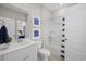 Well-lit bathroom with a single vanity, classic fixtures, and a shower-tub combination at 3316 Bay View Ct., North Myrtle Beach, SC 29582