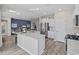 Spacious kitchen with stainless steel appliances, a large island, and modern finishes at 3316 Bay View Ct., North Myrtle Beach, SC 29582