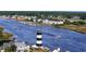 Lighthouse with views of the waterway, docks, and gorgeous waterfront homes in a stunning community setting at 3316 Bay View Ct., North Myrtle Beach, SC 29582