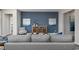 Inviting living room with modern furnishings and a serene blue accent wall at 3316 Bay View Ct., North Myrtle Beach, SC 29582