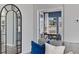 Cozy living room showcasing a large decorative mirror and a view into the office area at 3316 Bay View Ct., North Myrtle Beach, SC 29582
