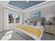 Serene main bedroom with a tray ceiling, soft lighting, and a large window view at 3316 Bay View Ct., North Myrtle Beach, SC 29582