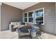 Comfortable outdoor patio area, perfect for relaxation and enjoying the natural light at 3316 Bay View Ct., North Myrtle Beach, SC 29582